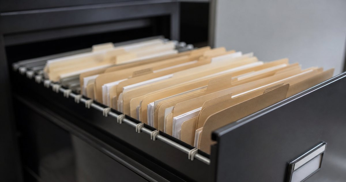 How should a school keep signed permission slip records organized and easy to find later?